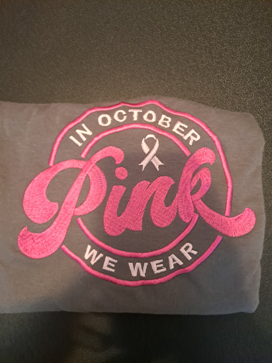 In October We Wear Pink embroidered on T Shirt